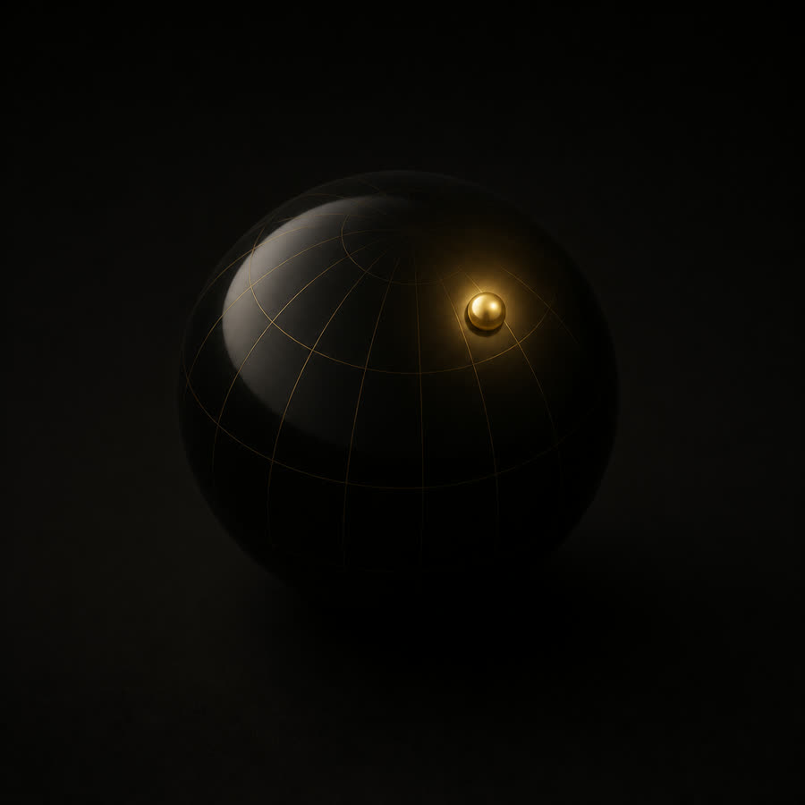 A dark globe with a single gold bead marking a place